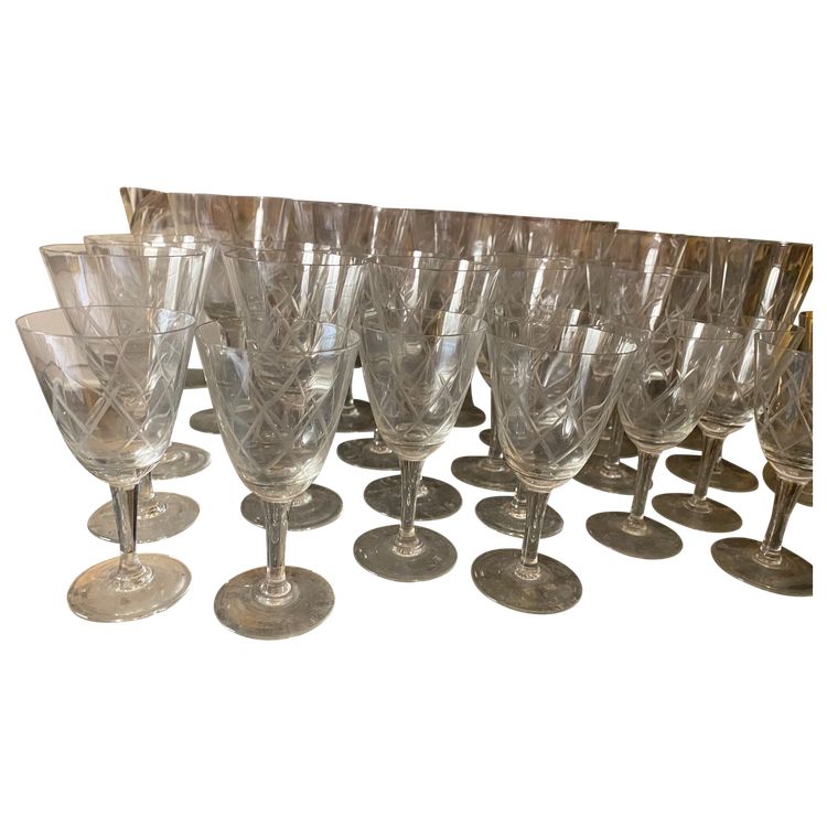 Set of 38 glasses and a carafe with stopper in fine crystal cut with diamond motifs, "50s" Years