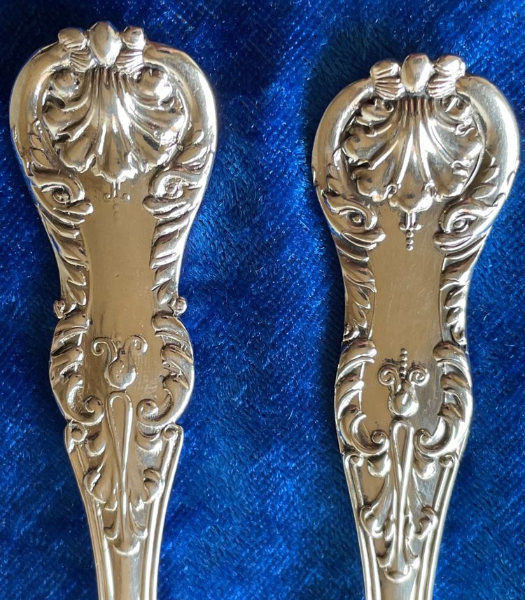 2 English cutlery sets.