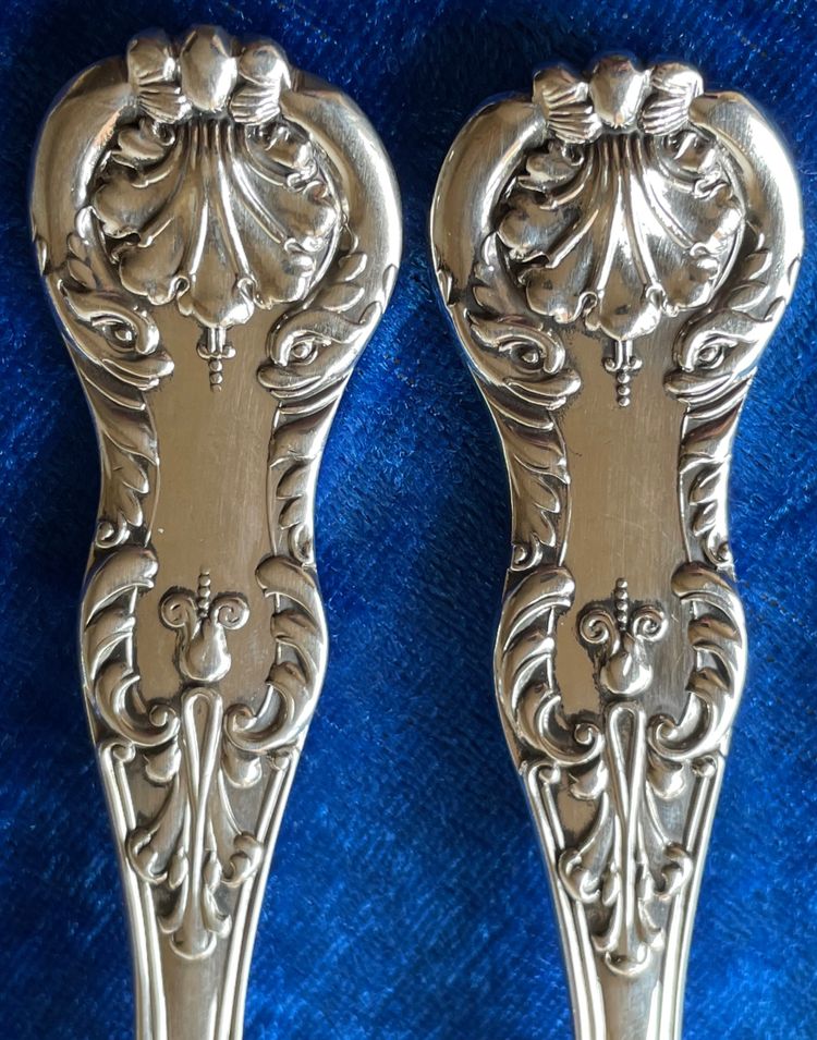 2 English cutlery sets.