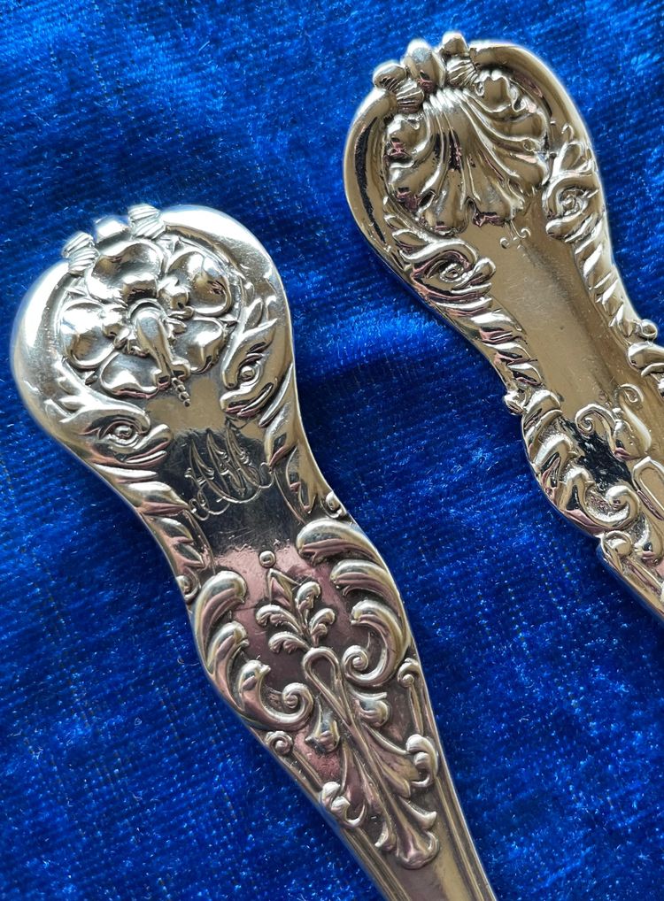 2 English cutlery sets.