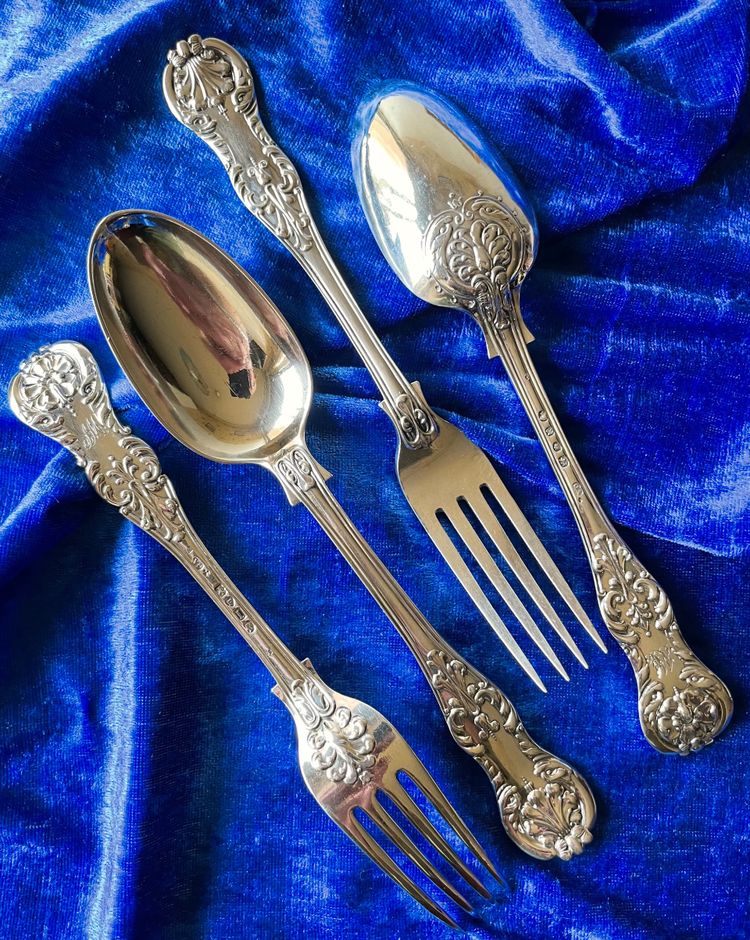 2 English cutlery sets.