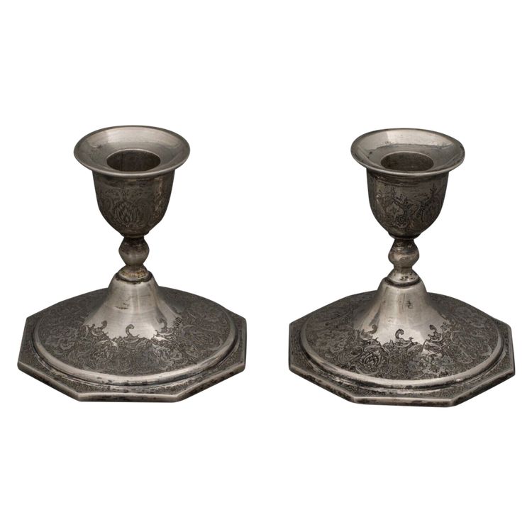 Pair of 19th century Persian silver candlesticks, engraved with bird design, hallmarked 84