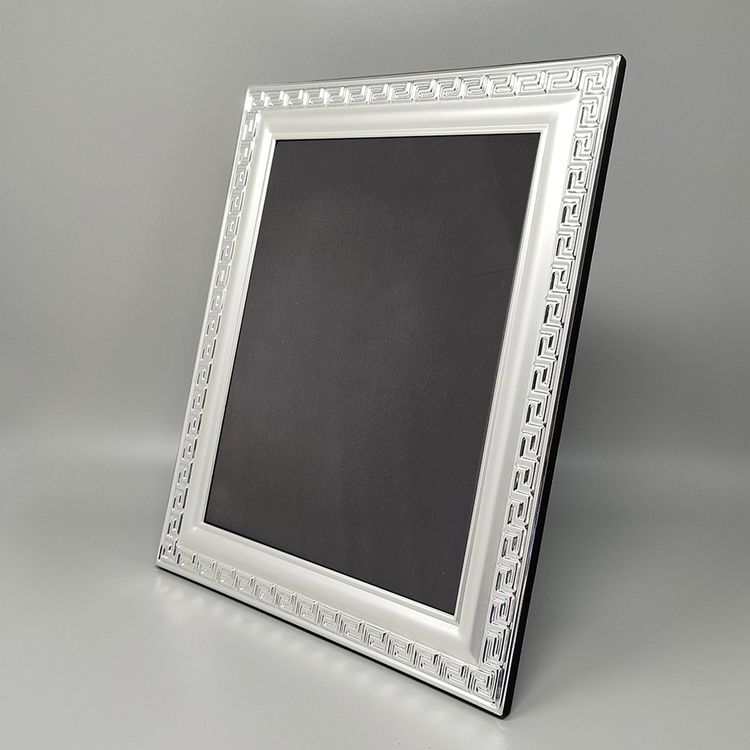 1970s Gorgeous photo frame in silver plated with glass. Made in Italy. The item is in excellent cond