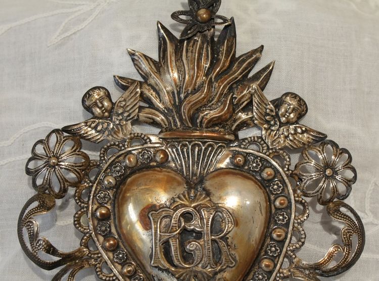 Ex-voto in fine embossed and filigree silver leaves, Italian work, early 20th century