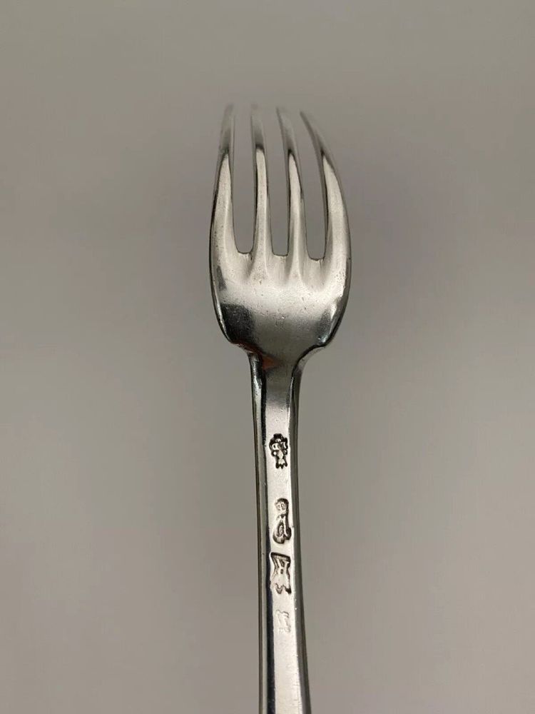 18th century solid silver fork, hallmarked by the general farmers, monogram NM