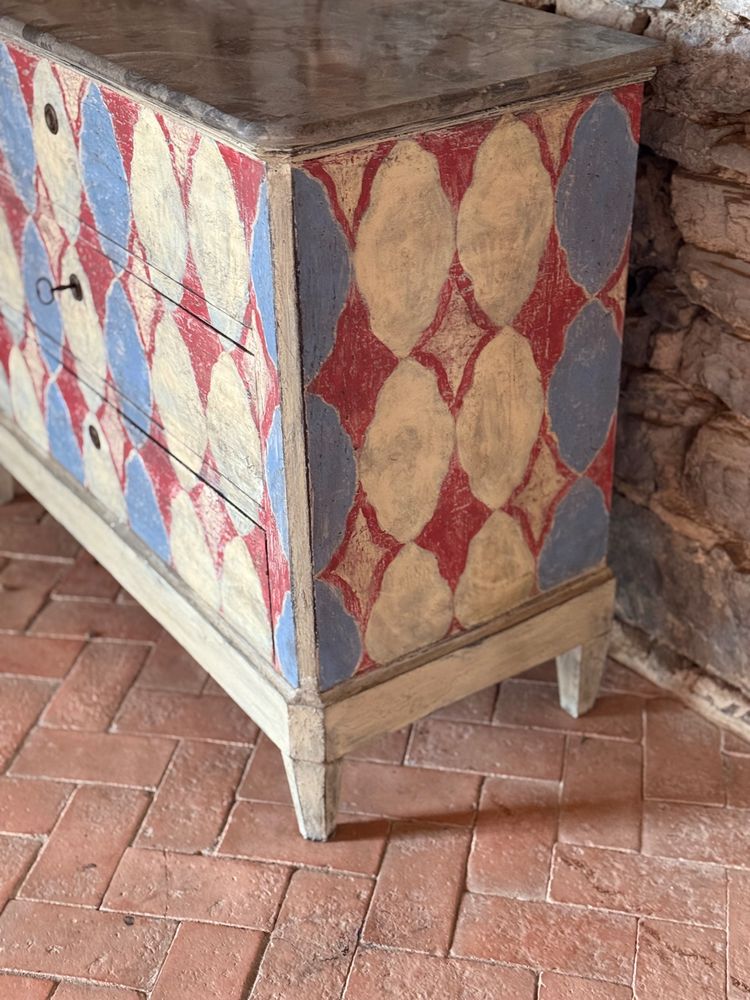 Napoleon III chest of drawers dating from the 19th century enhanced with pretty colored patterns and patina