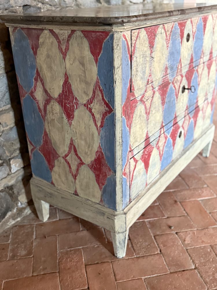 Napoleon III chest of drawers dating from the 19th century enhanced with pretty colored patterns and patina