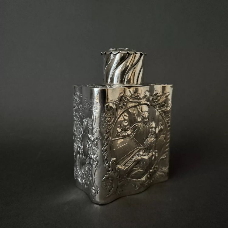 19th century silver tea box with romantic decor and Louis XV musicians