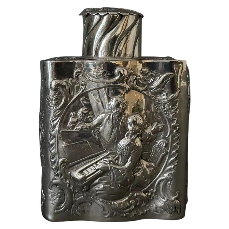 19th century silver tea box with romantic decor and Louis XV musicians