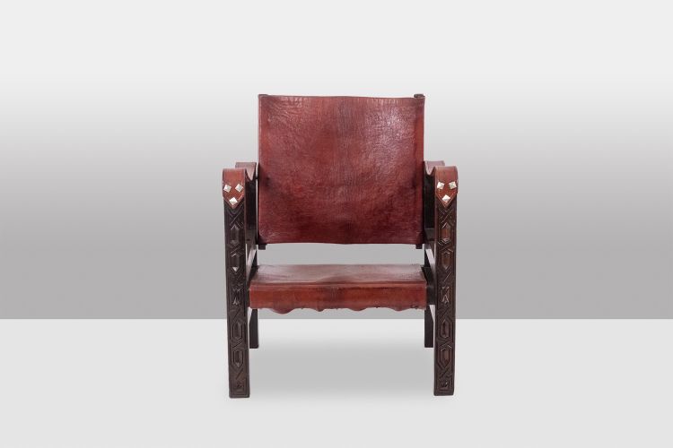 Poltrona “Safari” in legno e pelle cognac. Anni '60/'70. Codice articolo: LS6311309M