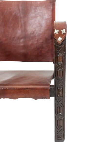 Poltrona “Safari” in legno e pelle cognac. Anni '60/'70. Codice articolo: LS6311309M