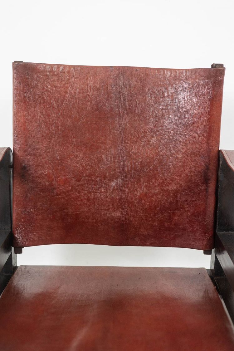 Poltrona “Safari” in legno e pelle cognac. Anni '60/'70. Codice articolo: LS6311309M