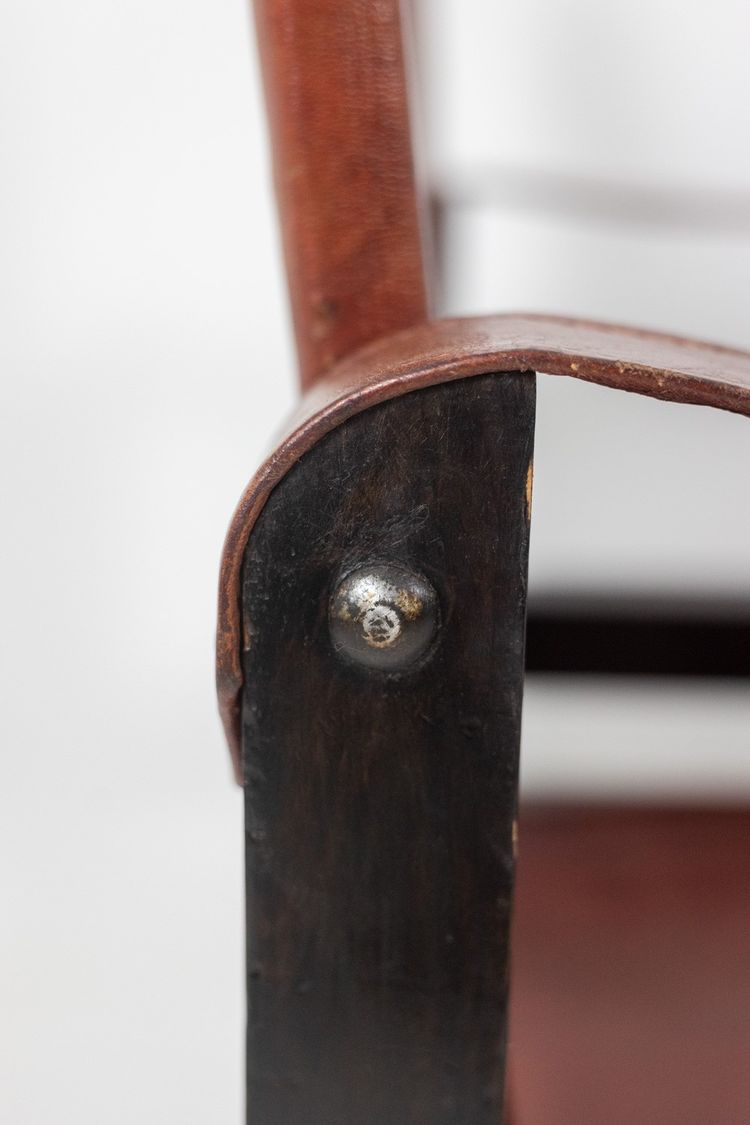 Poltrona “Safari” in legno e pelle cognac. Anni '60/'70. Codice articolo: LS6311309M