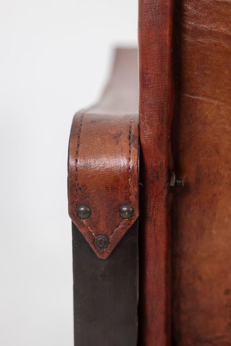 Poltrona “Safari” in legno e pelle cognac. Anni '60/'70. Codice articolo: LS6311309M