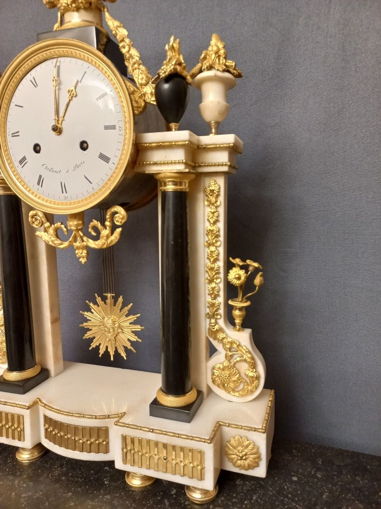 18th century gilt bronze and marble clock