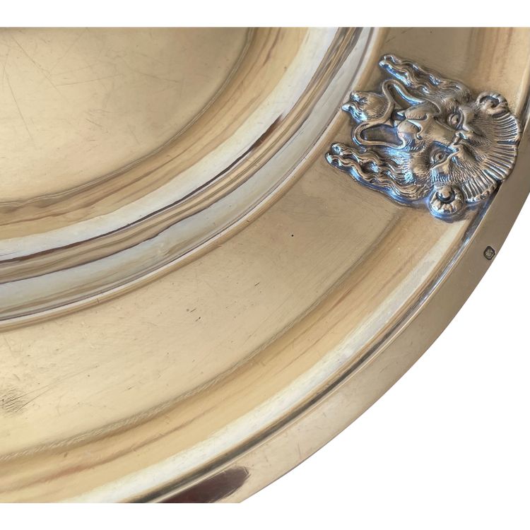Semi-hollow solid silver dish.