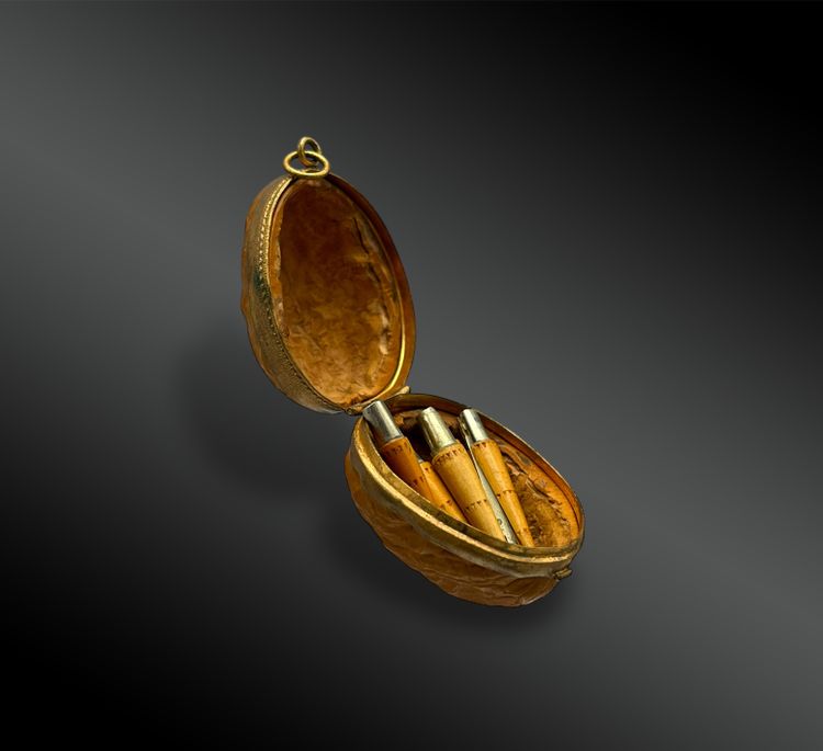 WALNUT SHELL and its 7 miniature NONTRON KNIVES - France - 20th century