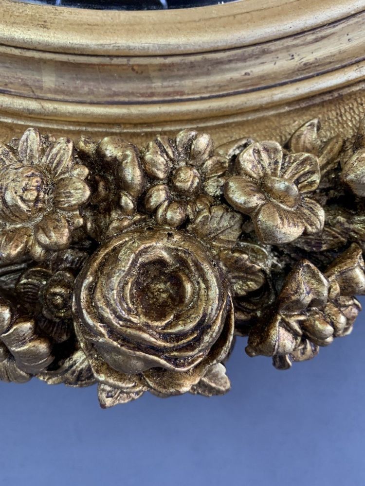 19th Century Gilded Mirror with Floral Motifs