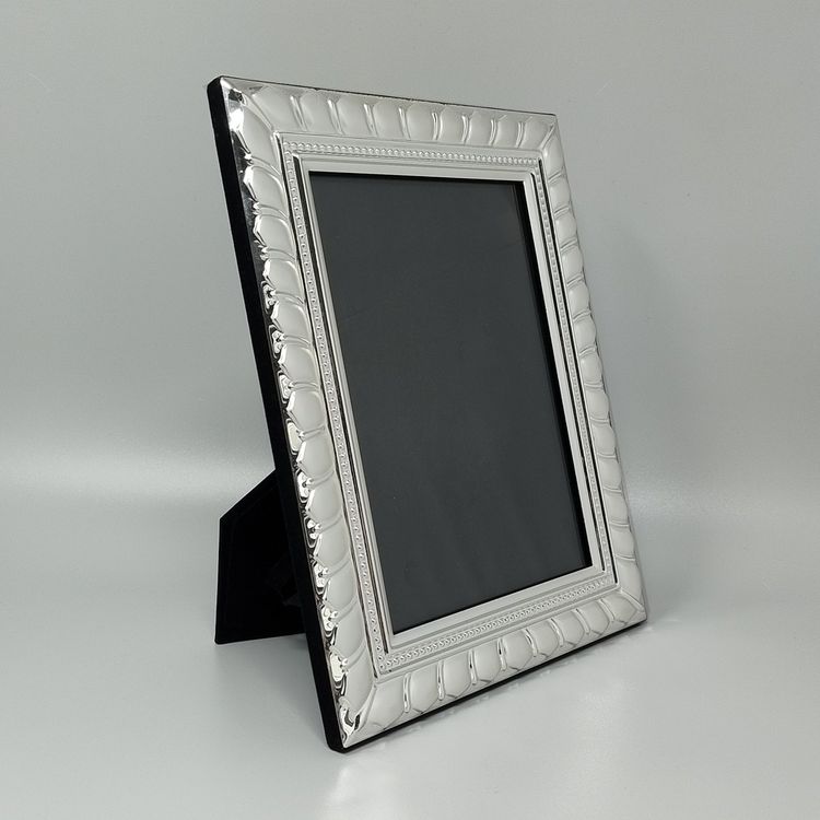 Superbe cadre photo des années 1970 en plaqué argent et verre. Fabriqué en Italie.