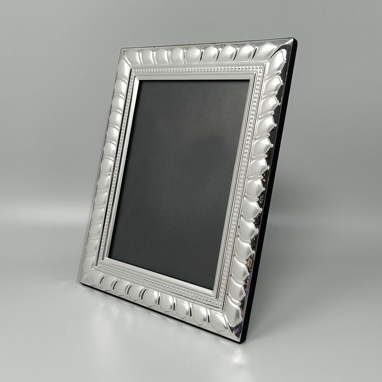 Superbe cadre photo des années 1970 en plaqué argent et verre. Fabriqué en Italie.