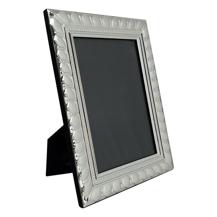 Superbe cadre photo des années 1970 en plaqué argent et verre. Fabriqué en Italie.