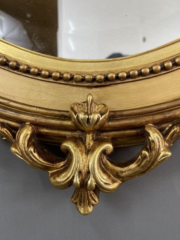 Specchio ovale in legno dorato Napoleone III