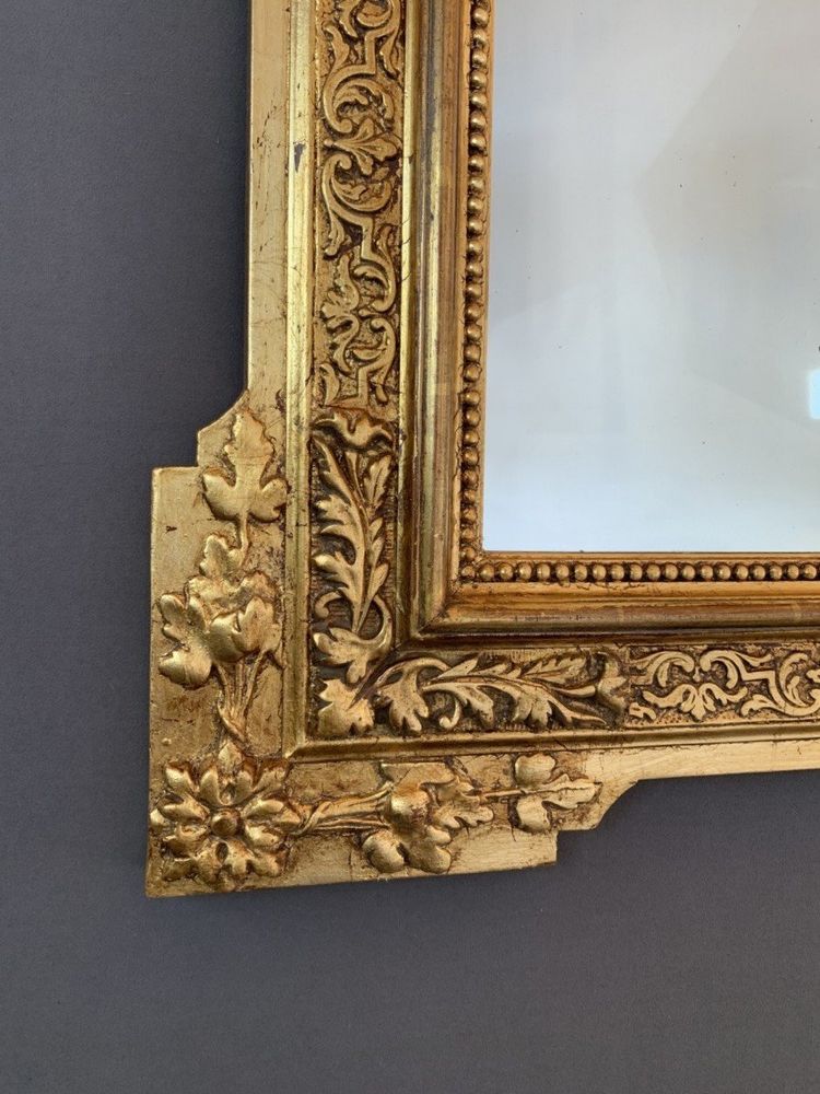 Specchio in legno intagliato e dorato in stile Luigi XVI, XIX secolo