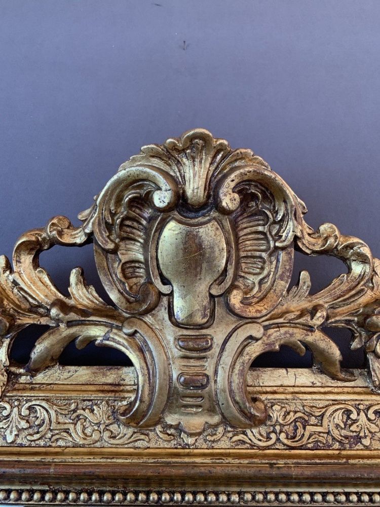 Specchio in legno intagliato e dorato in stile Luigi XVI, XIX secolo