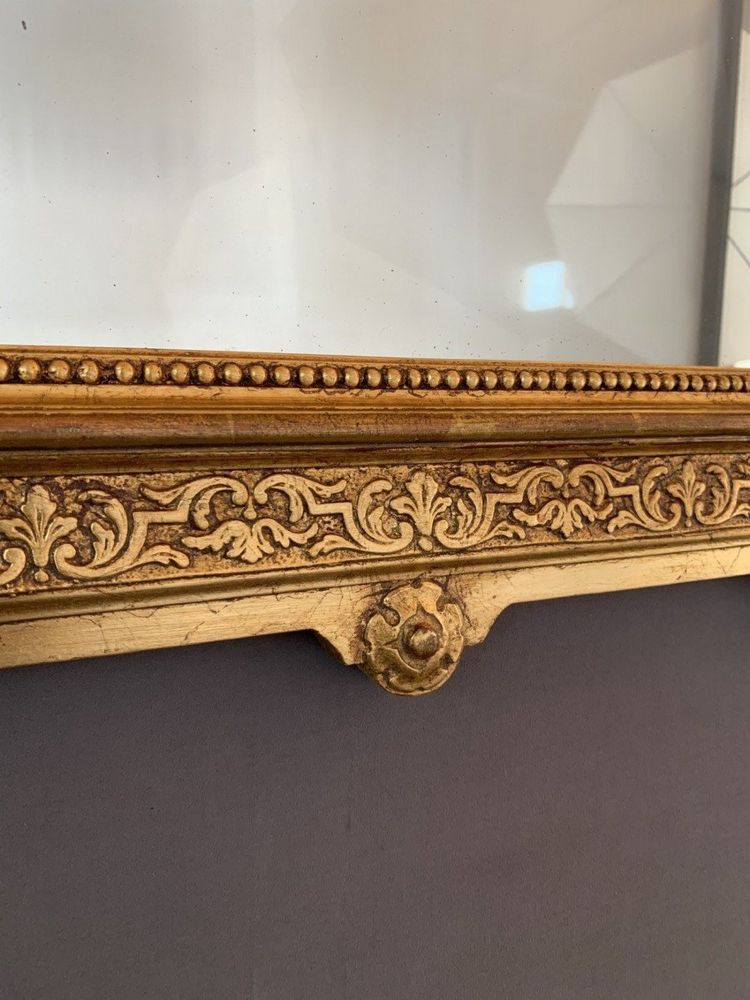 Specchio in legno intagliato e dorato in stile Luigi XVI, XIX secolo