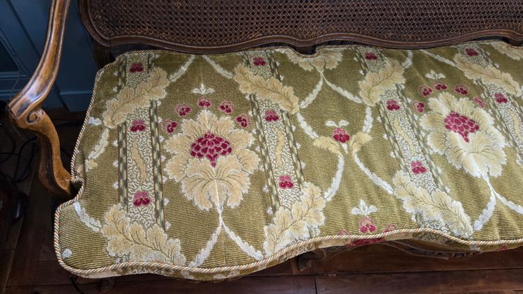 Louis XV period sofa with cane base, Lyonnais work attributed to Pierre Nogaret.
