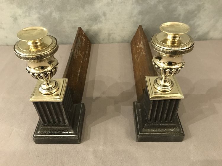 Beautiful pair of antique cast iron and brass andirons from the early 19th century
