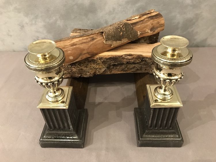 Beautiful pair of antique cast iron and brass andirons from the early 19th century