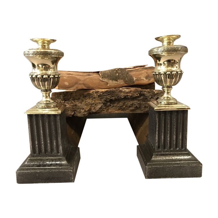 Beautiful pair of antique cast iron and brass andirons from the early 19th century