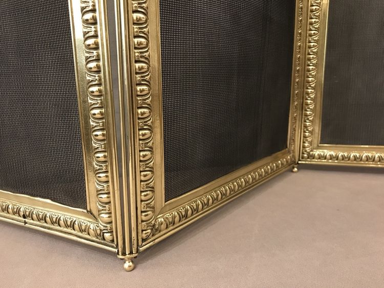 19th century pressed brass fireplace screen