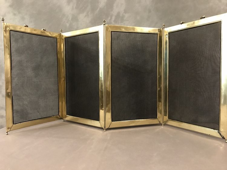 19th century pressed brass fireplace screen