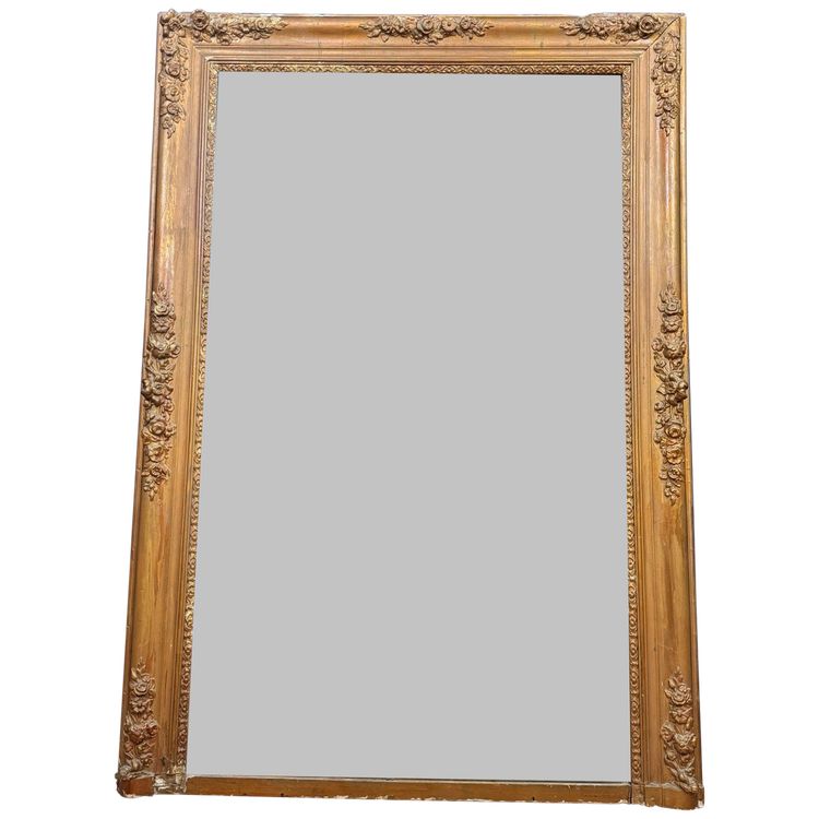 Empire period mirror in wood and gilded stucco circa 1810-1820