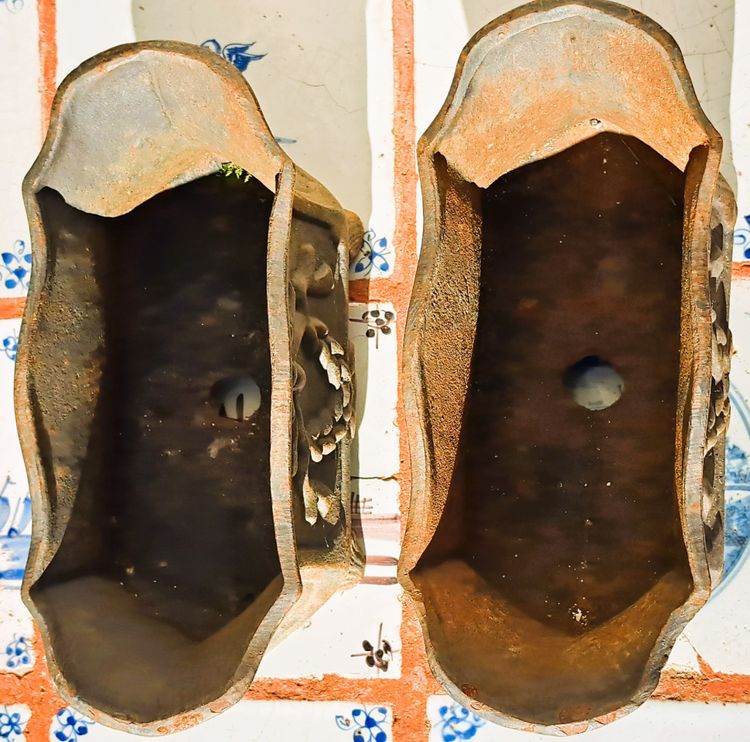 Pair of small cast-iron planters in the Louis XVI style