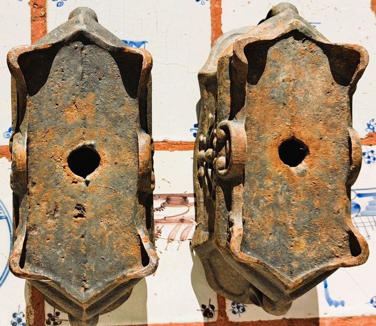 Pair of small cast-iron planters in the Louis XVI style