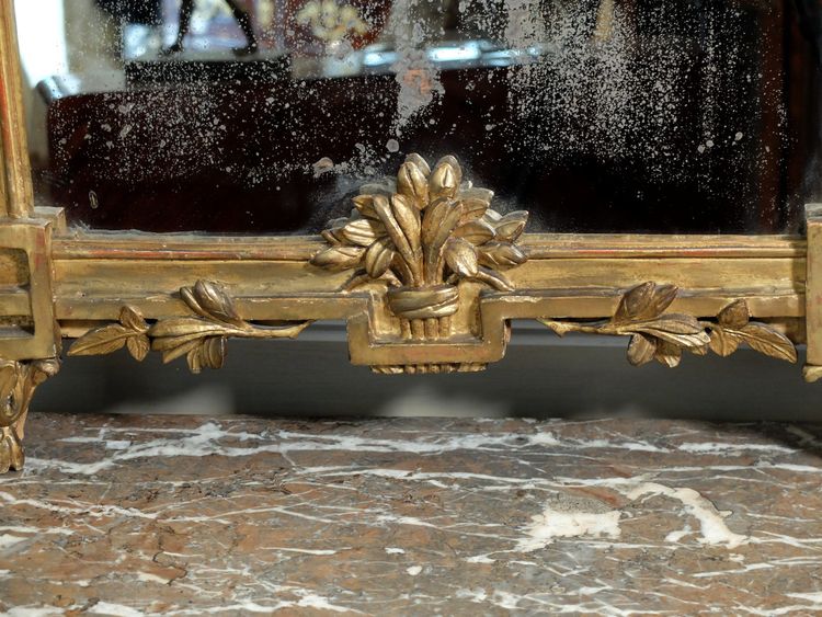 Louis XVI gilded wood mirror