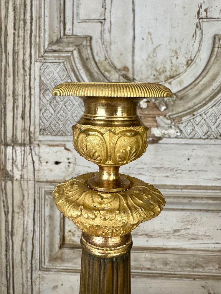 Coppia di candelieri in bronzo Periodo di restauro