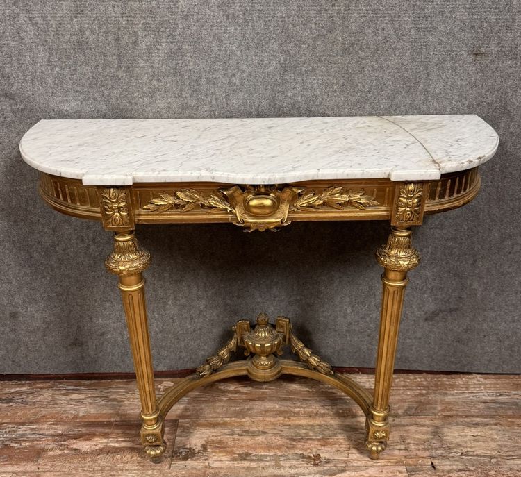 Louis XVI style half-moon console in gilded and carved wood circa 1850