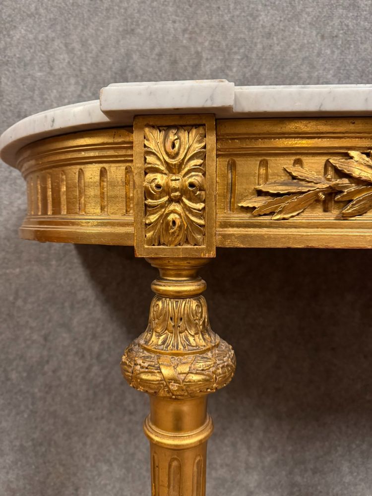 Louis XVI style half-moon console in gilded and carved wood circa 1850