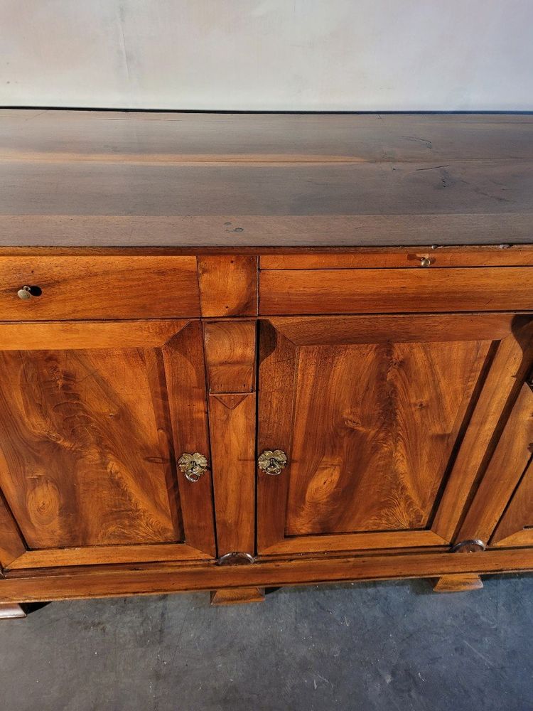 Restoration period sideboard in solid walnut.
