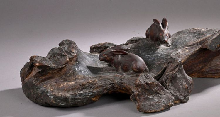 Okimono - Sculpture of rabbits walking in a landscape.
