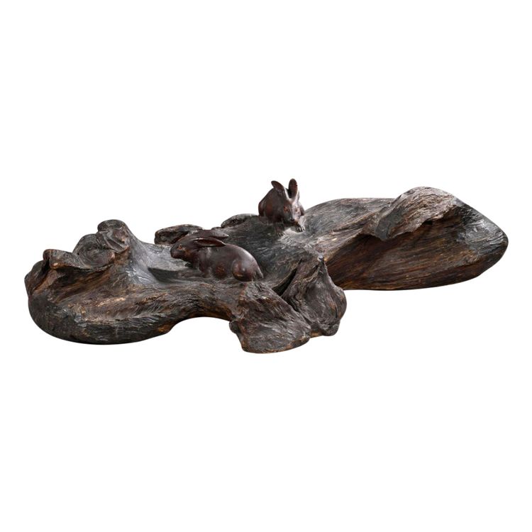 Okimono - Sculpture of rabbits walking in a landscape.