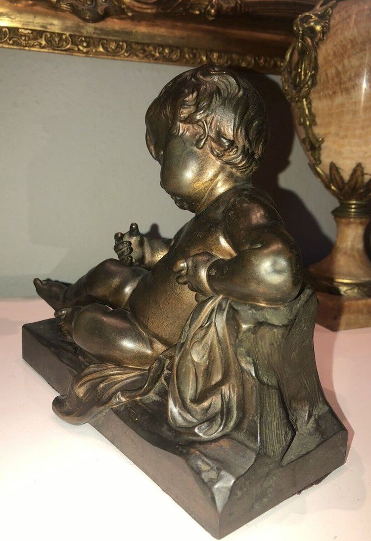 Grande Putto in bronzo con patina Medaglia anonima H. 21 cm