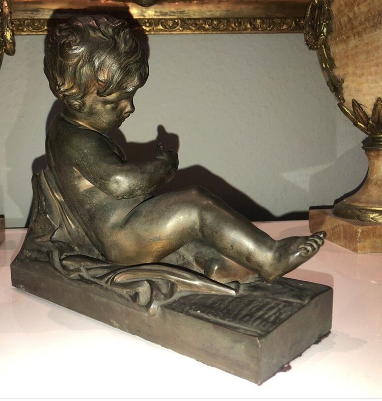 Grande Putto in bronzo con patina Medaglia anonima H. 21 cm