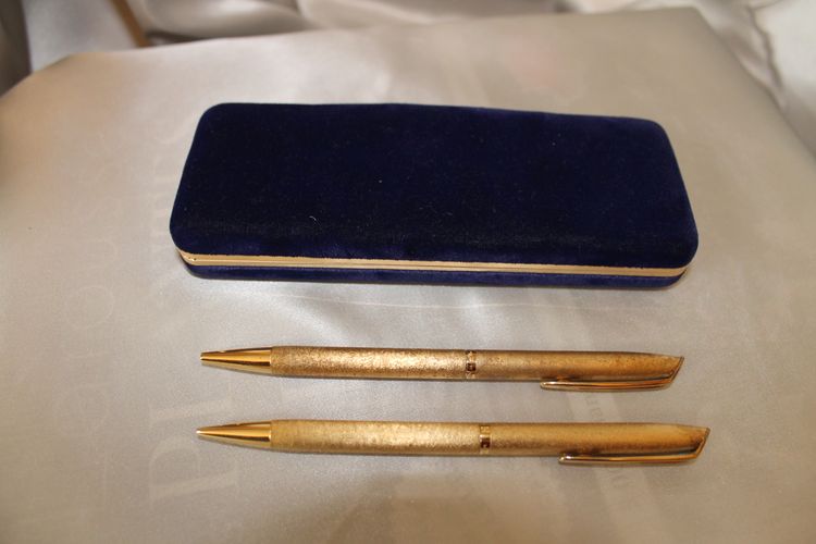 Waterman gold-plated ballpoint pens in box and Globus Judaica silver pen, 20th c.