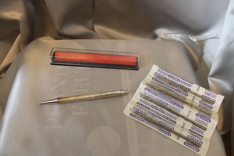 Waterman gold-plated ballpoint pens in box and Globus Judaica silver pen, 20th c.
