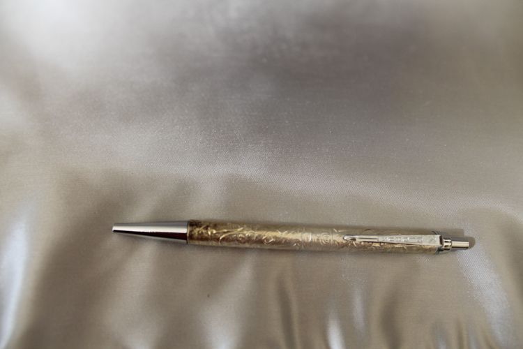 Waterman gold-plated ballpoint pens in box and Globus Judaica silver pen, 20th c.